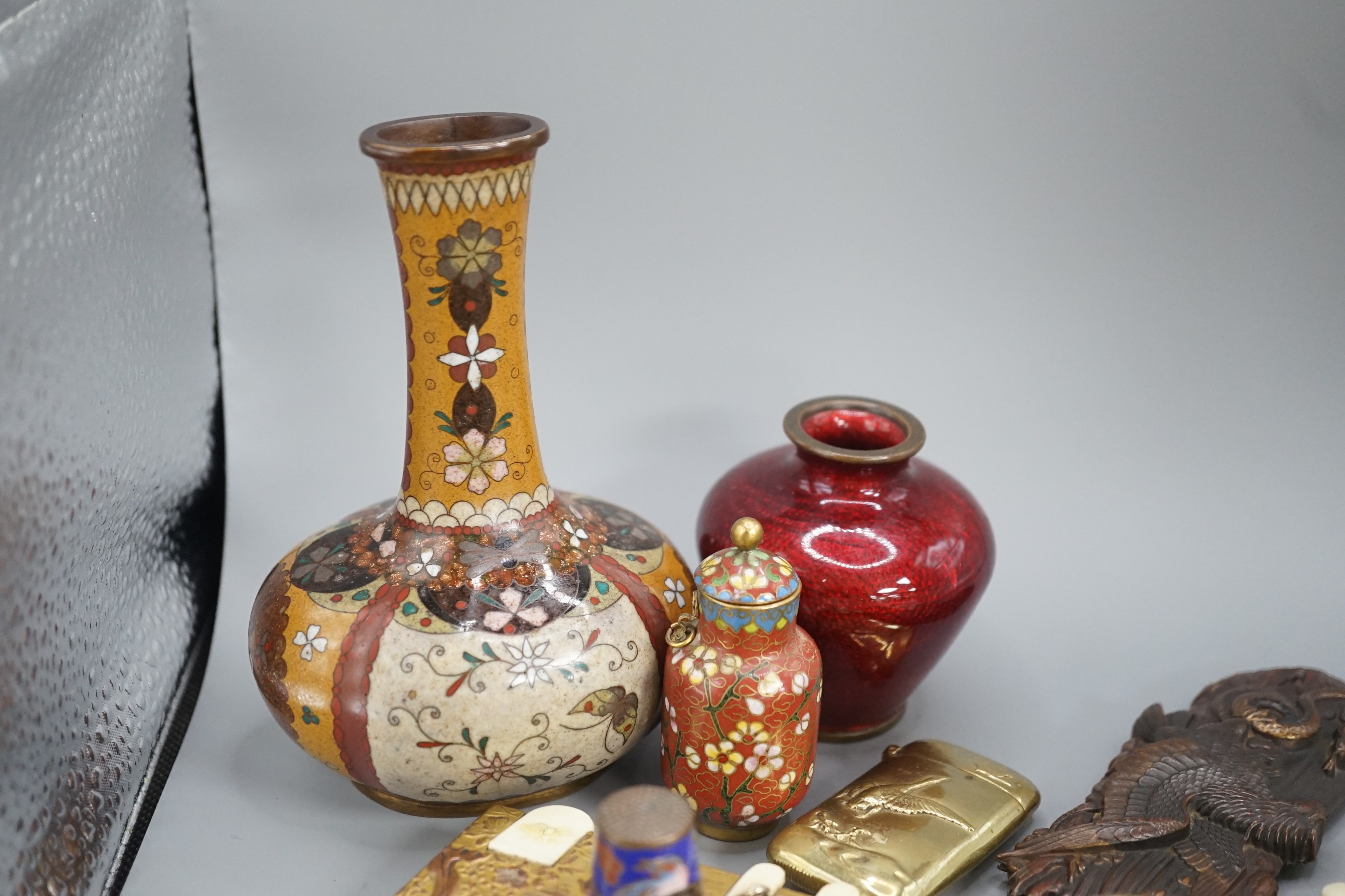 A group of Chinese and Japanese miniature cloisonne enamel vases, 6cm - 12.5cm, a Japanese mixed metal paper knife or page turner and a pair of Japanese antimony and celluloid bezique markers